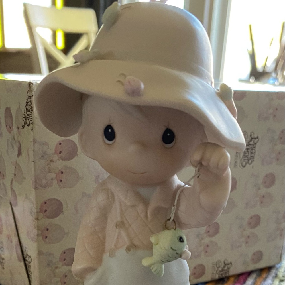Enesco Cream and Pale Pink Boy Figurine with Fish Charm. Precious moments 1986